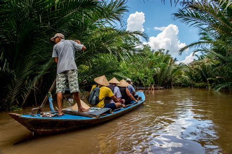 Balade en sampan le long des canaux